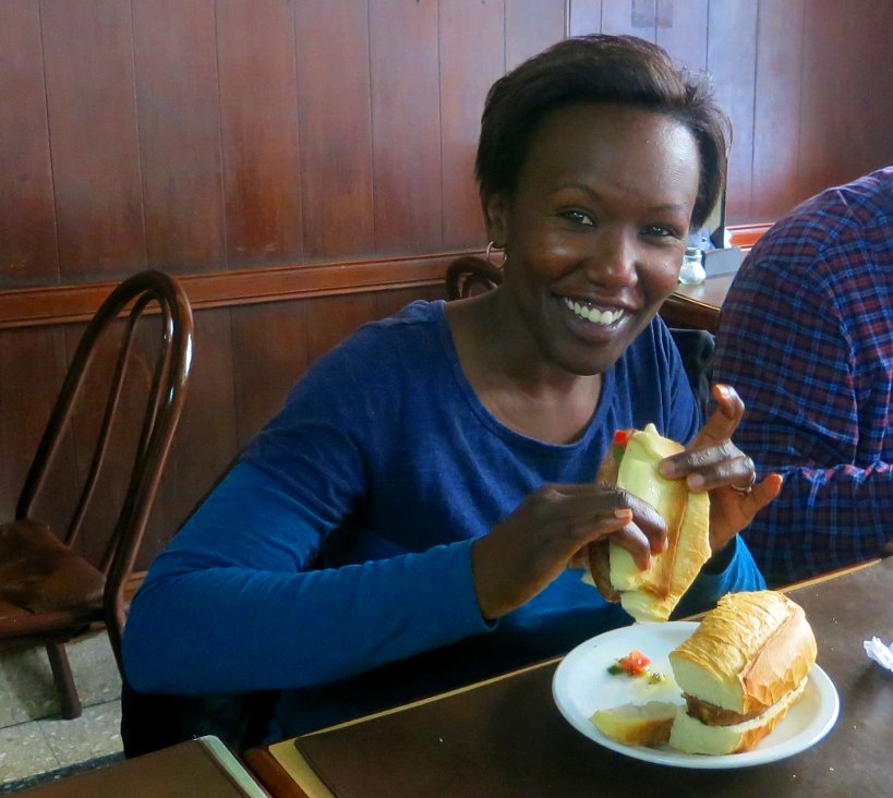 Rosemary eating Choripan Buenos Aires Food Tour Authentic Food Quest