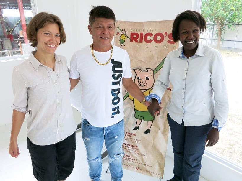 Claire and Rosemary with Rico Rico's lechon by Authentic Food Quest