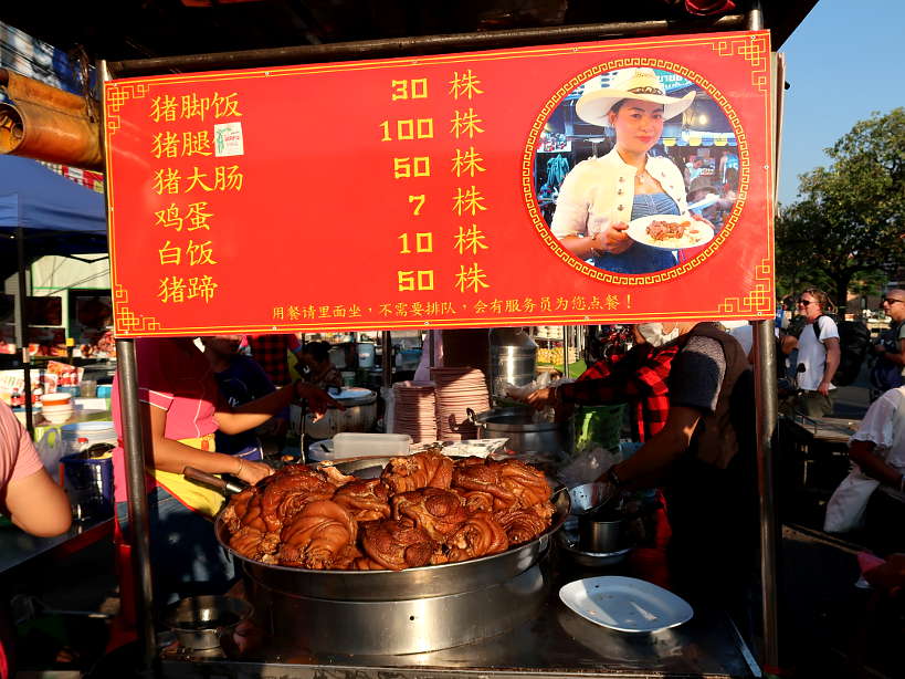 Cowboy Hat Lady Stall in Chiang Mai Street Food by Authentic Food Quest. One of the most delicious stalls at the Chiang Mai market