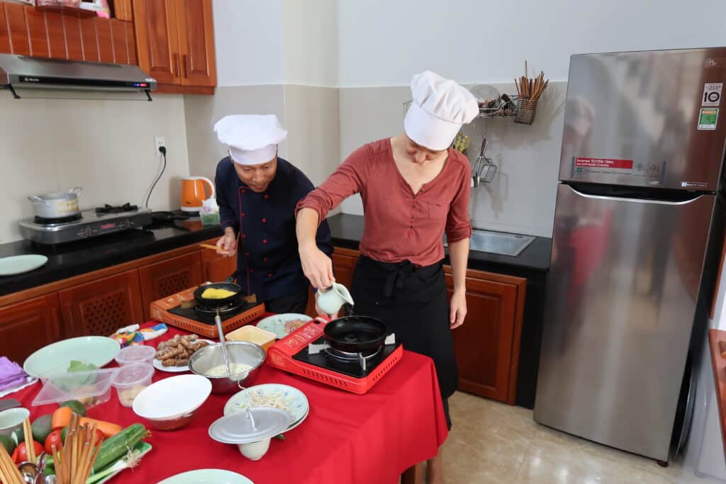 Preparing Meal Take Cooking Classes by Authentic Food Quest