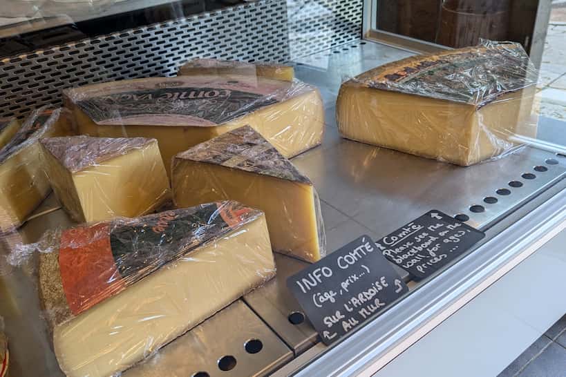 Cheesemonger Shops Comte Cheese by Authentic Food Quest