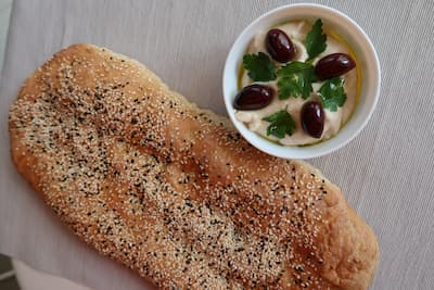 Traditional Cretan bread with olives by Authentic Food Quest Crete cooking vacations