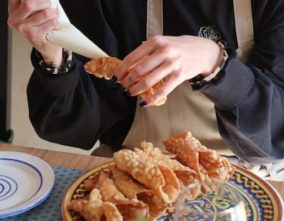 Making cannoli on a cooking class in Sicily with Authentic Food Quest